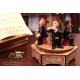 Carousel music box with 4 musician: flutist, pianist, double bass player and violinist.
